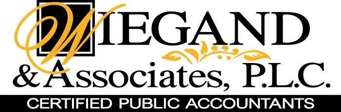 Wiegand and Associates, P.L.C. logo